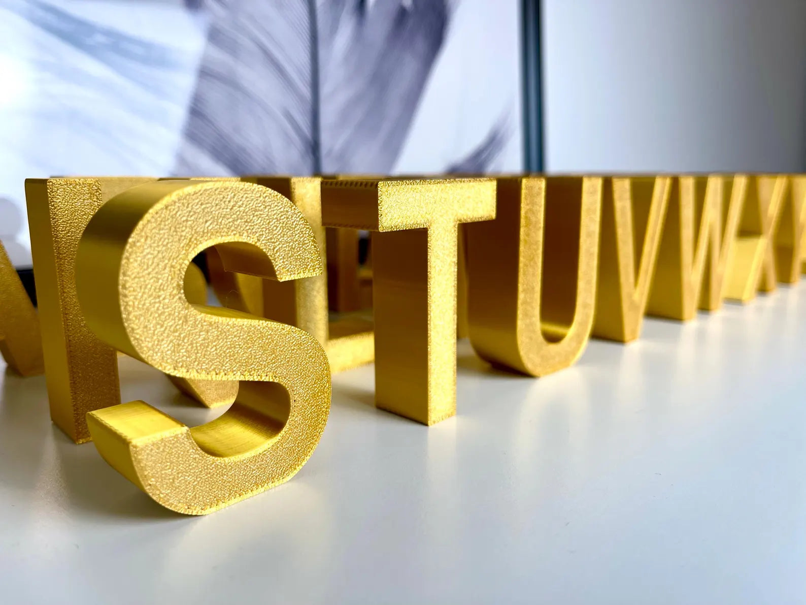 Freistehende Gold/Silber Buchstaben